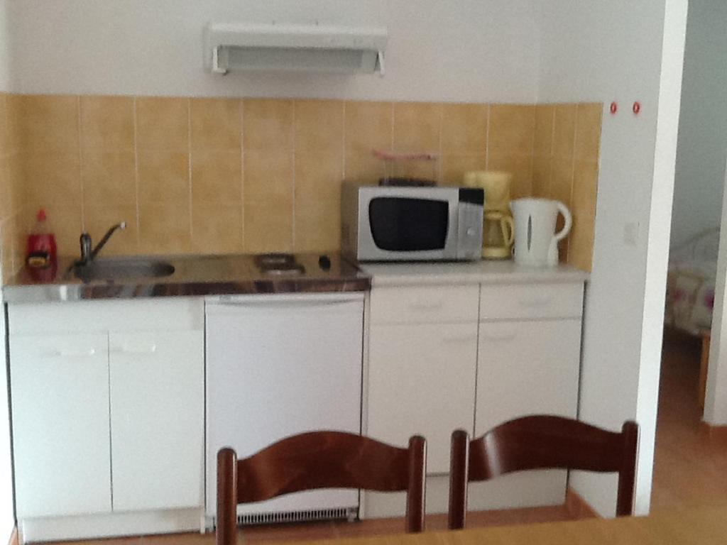 Appartements " Le Clos De La Cerisaie" Castillon-du-Gard Room photo
